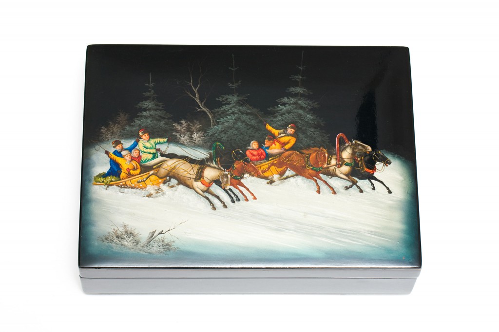 Russian lacquerÂ box depicting two racing troikas in a Russian winter scene