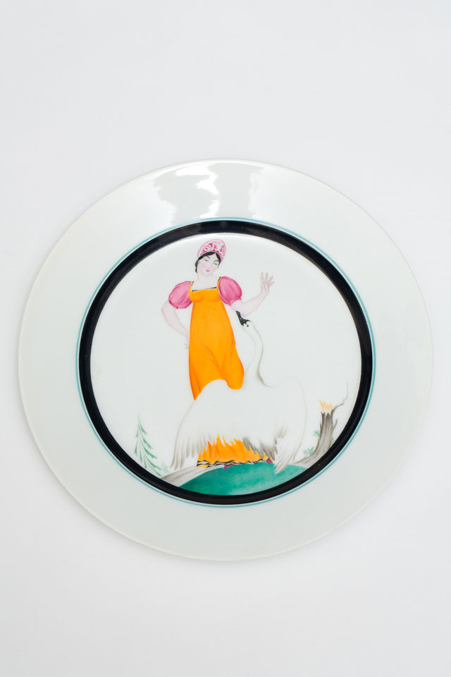 Russian revolutionary plate depicting a lady and a swan, State Porcelain Factory, 1922