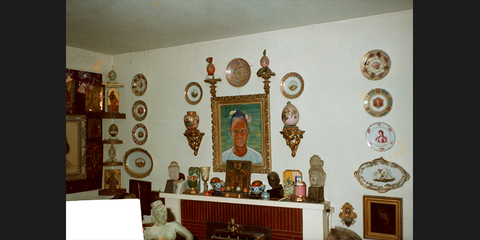 Display over the fireplace in the Dorich House living room, c.1980s. © Historic England