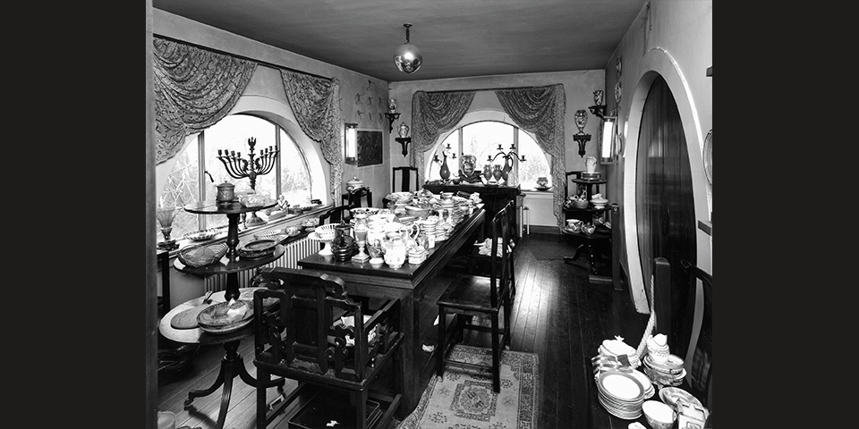 The china collection assembled for probate in the Dorich House dining room, 1992. © Historic England